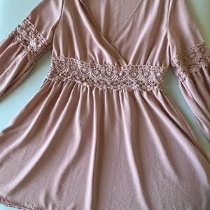 Lt pink dress see-thru crochet details on waist & sleeves. Plunging neckline.